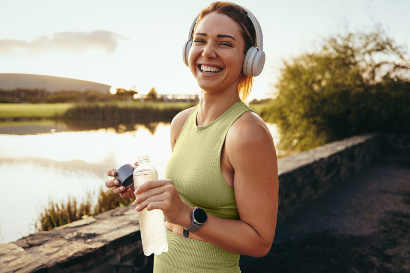 Photo of happy, smiling woman used as a feature image for an article about alternative medicine in Sydney.