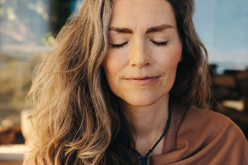 Photo of a woman meditating, reflecting ayurvedic medicine in Sydney.